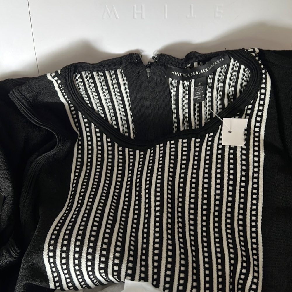 Black and white sleeveless top casual or formal